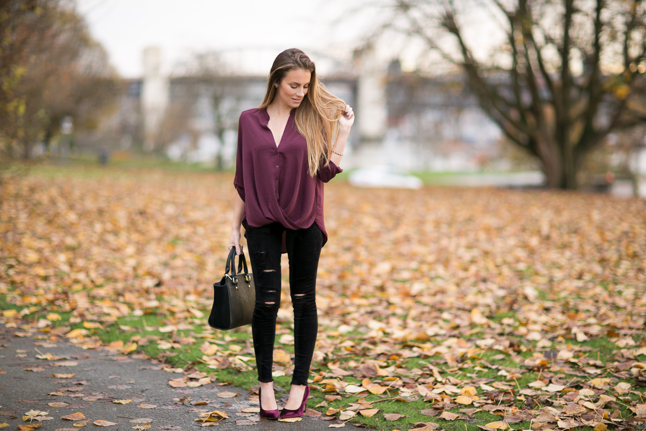 Nordstrom fall outfit lush burgundy twist front button up blouse black distressed frame denim skinny jeans sam edelman burgundy velvet heels angela lanter hello gorgeous