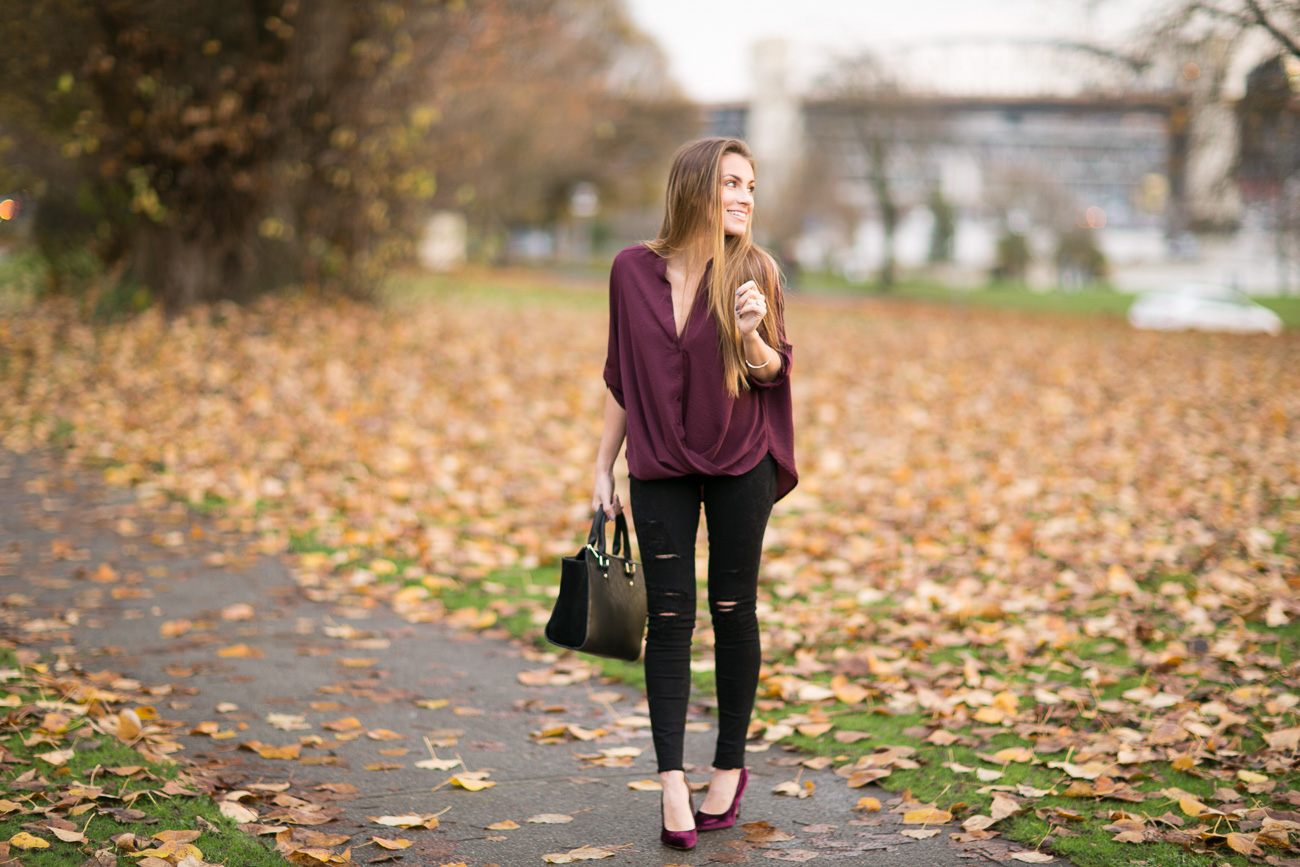 Nordstrom fall outfit lush burgundy twist front button up blouse black distressed frame denim skinny jeans sam edelman burgundy velvet heels angela lanter hello gorgeous