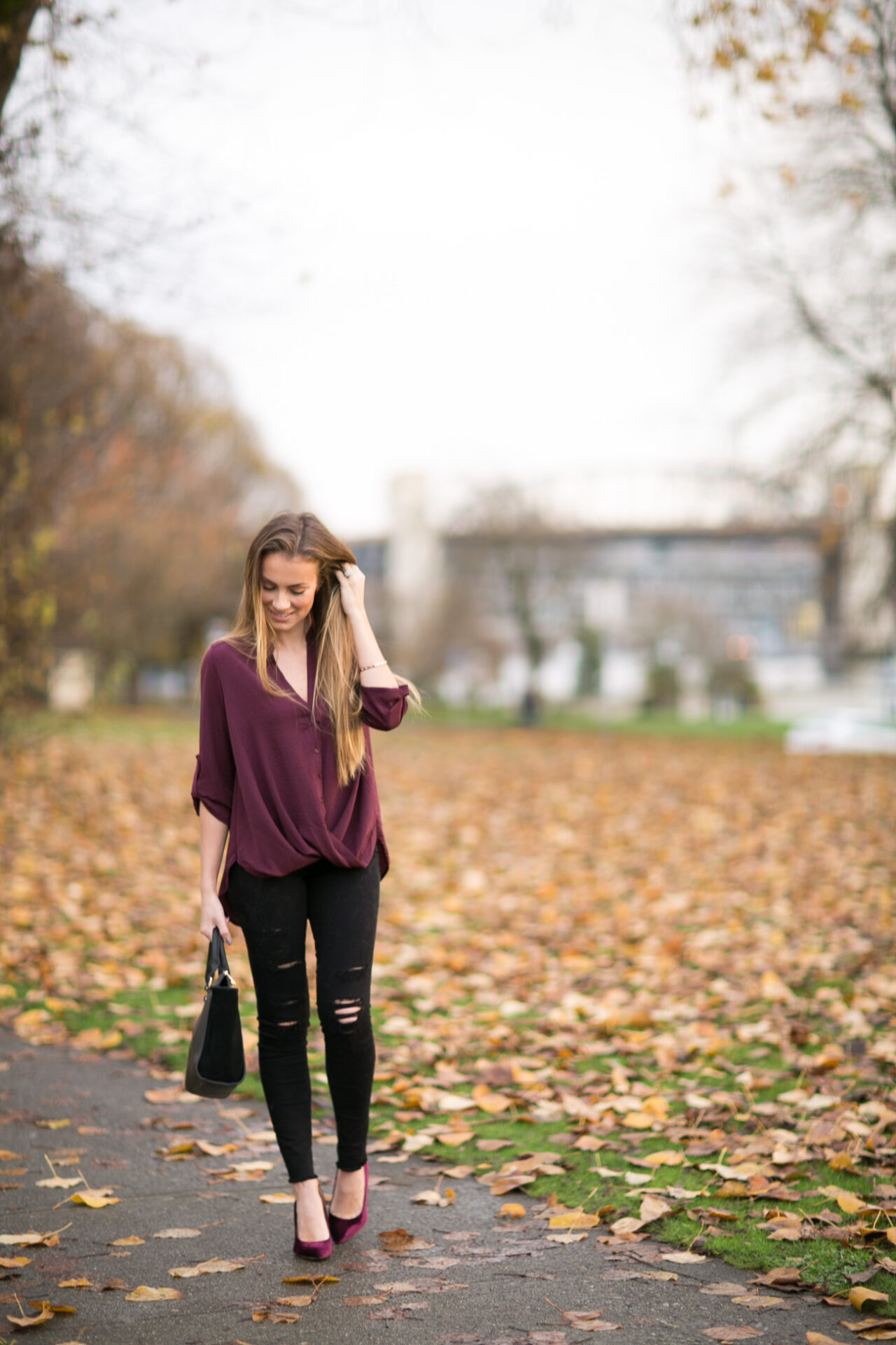 Nordstrom fall outfit lush burgundy twist front button up blouse black distressed frame denim skinny jeans sam edelman burgundy velvet heels angela lanter hello gorgeous