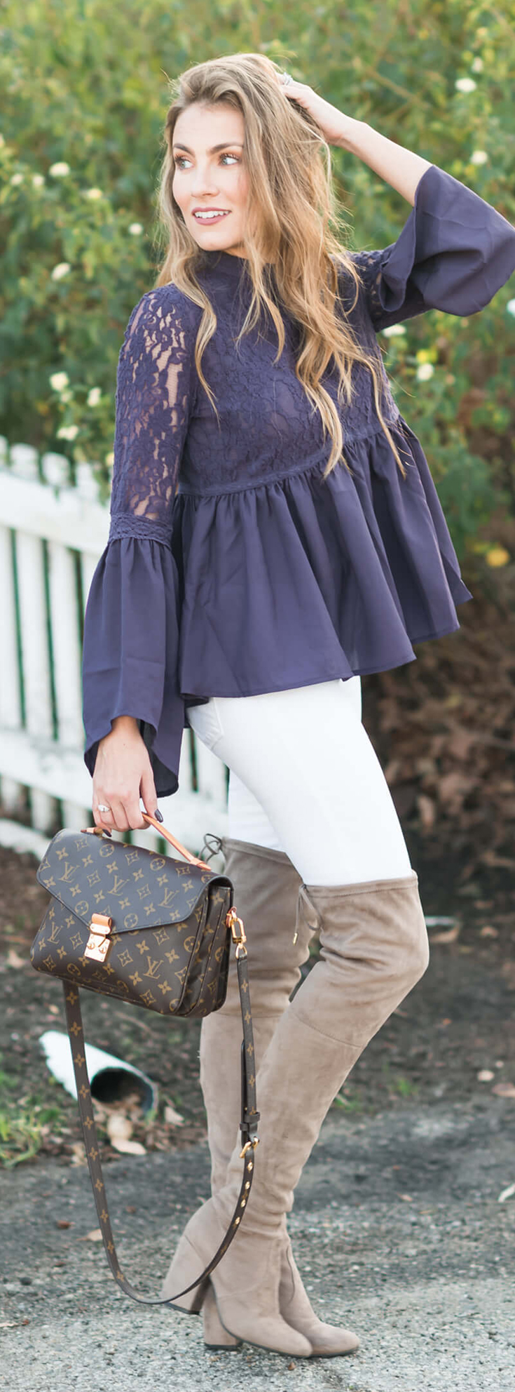 Winter Outfit I love: Blue Lace Peplum top, White Skinny Jeans, Steve Madden Over the knee boots, and Louis Vuitton Pochette Metis. Angela Lanter - Hello Gorgeous.