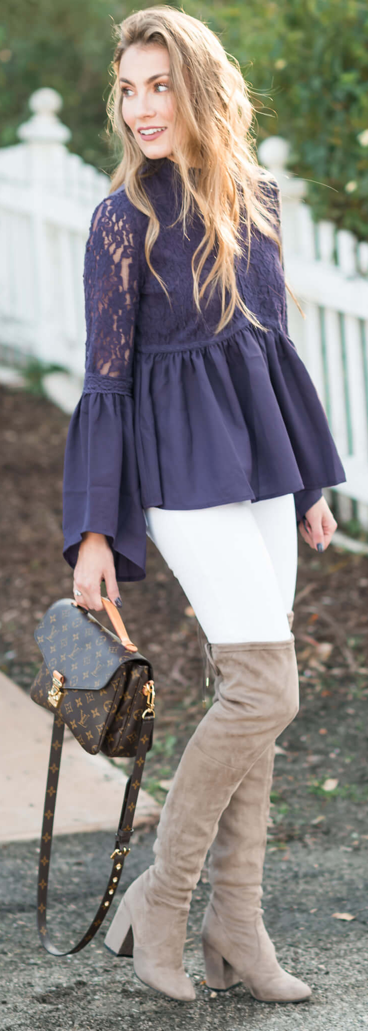 Winter Outfit I love: Blue Lace Peplum top, White Skinny Jeans, Steve Madden Over the knee boots, and Louis Vuitton Pochette Metis. Angela Lanter - Hello Gorgeous.