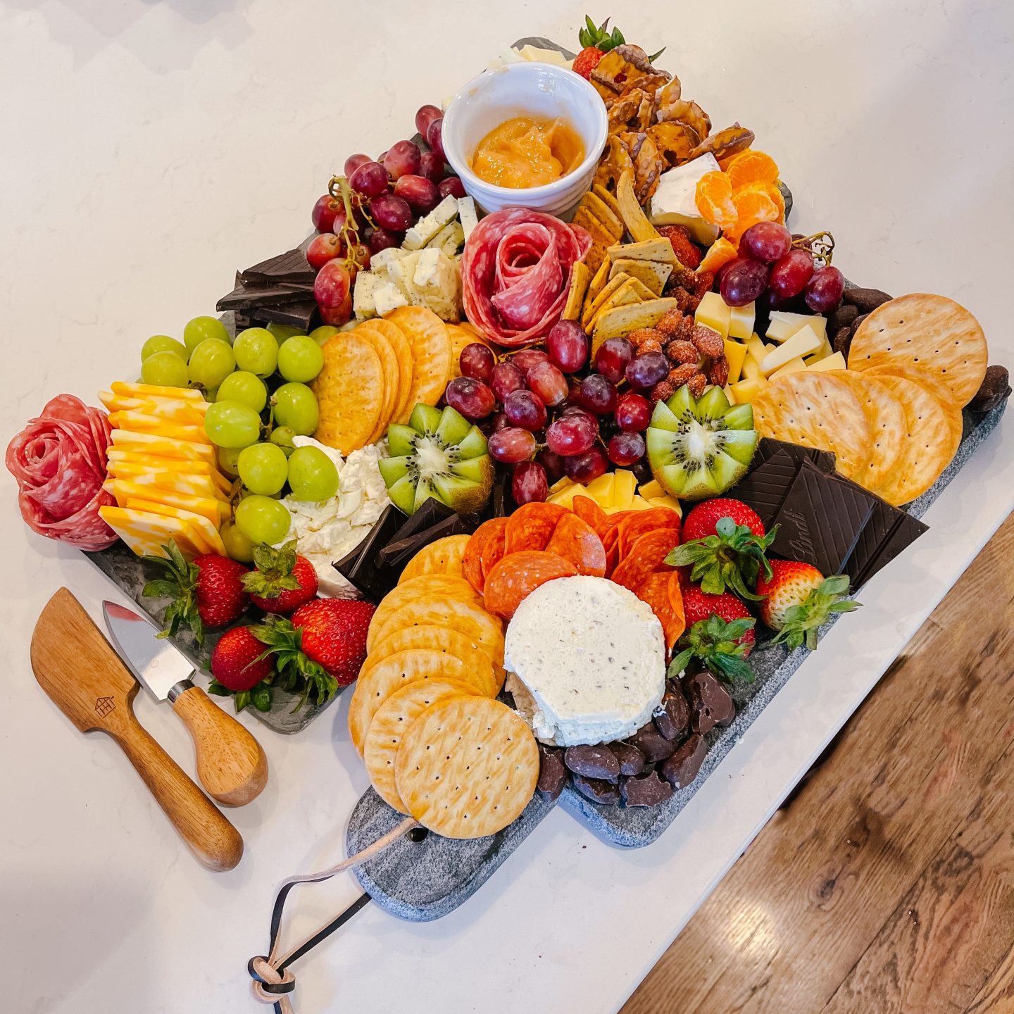 DIY Charcuterie Board Cheese fruit tray on slate cutting board party hosting angela lanter