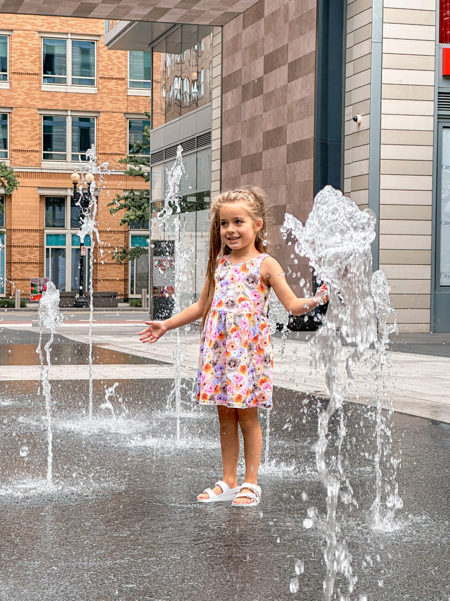 Palmer Alley umbrella alley in Washington DC fountains in City Center by Lifestyle and travel blogger Angela Lanter