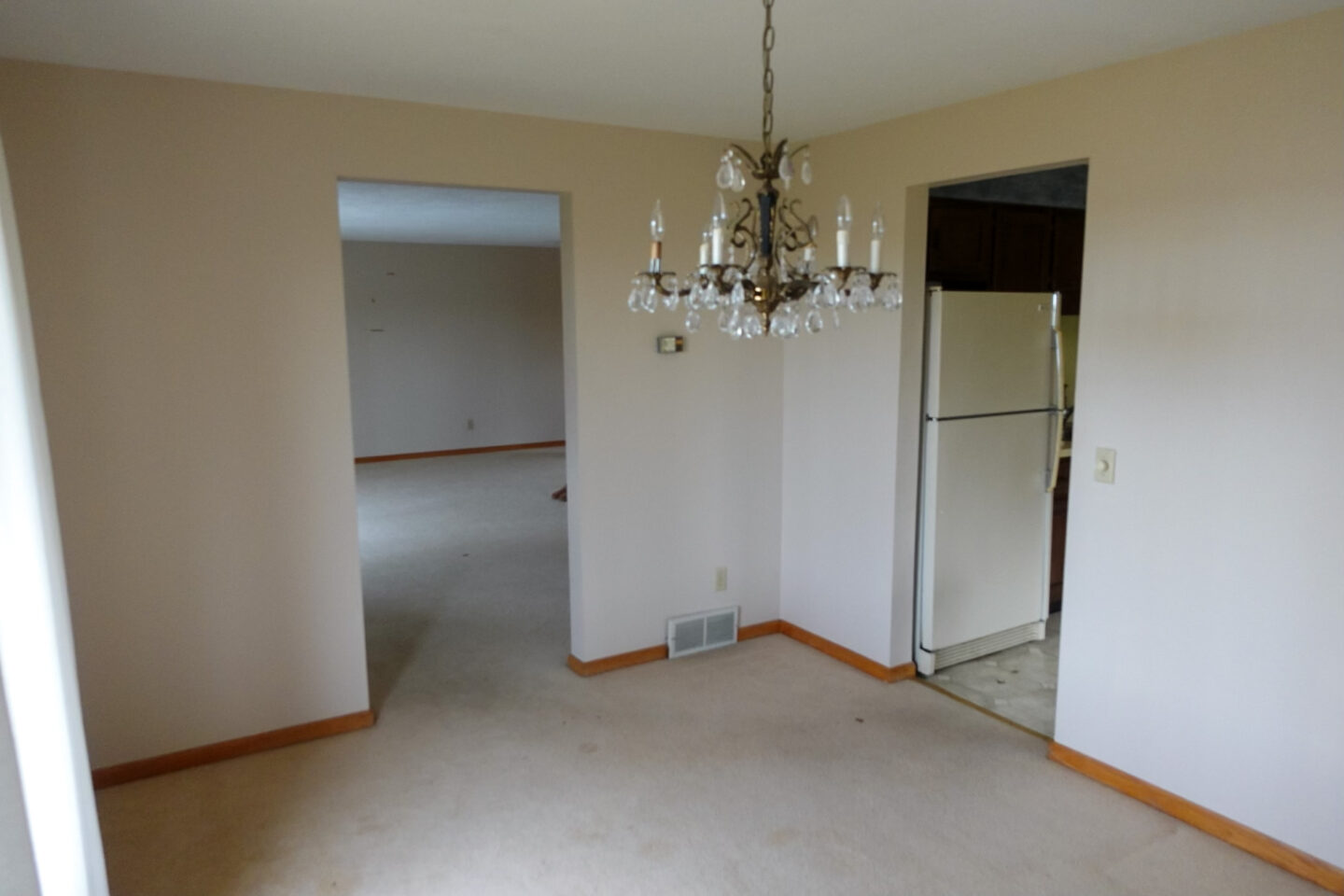 dining room before photos of Ohio renovation house project by home and style blogger Angela Lanter