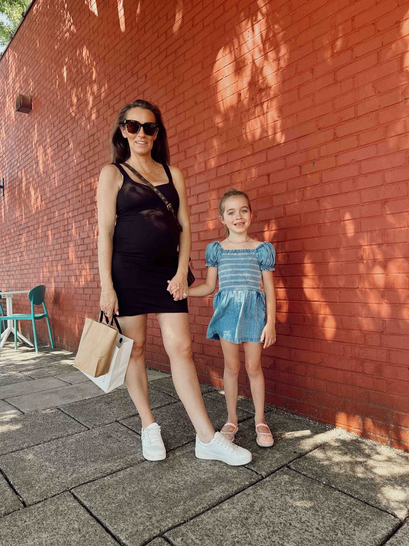 second trimester cute pregnancy outfits by lifestyle blogger angela lanter wearing Bumpuit