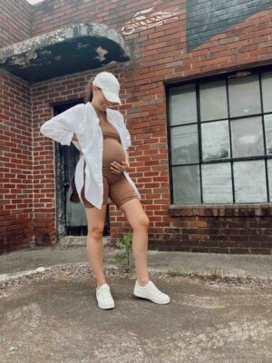 second trimester cute pregnancy outfits by lifestyle blogger angela lanter wearing Bumpuit
