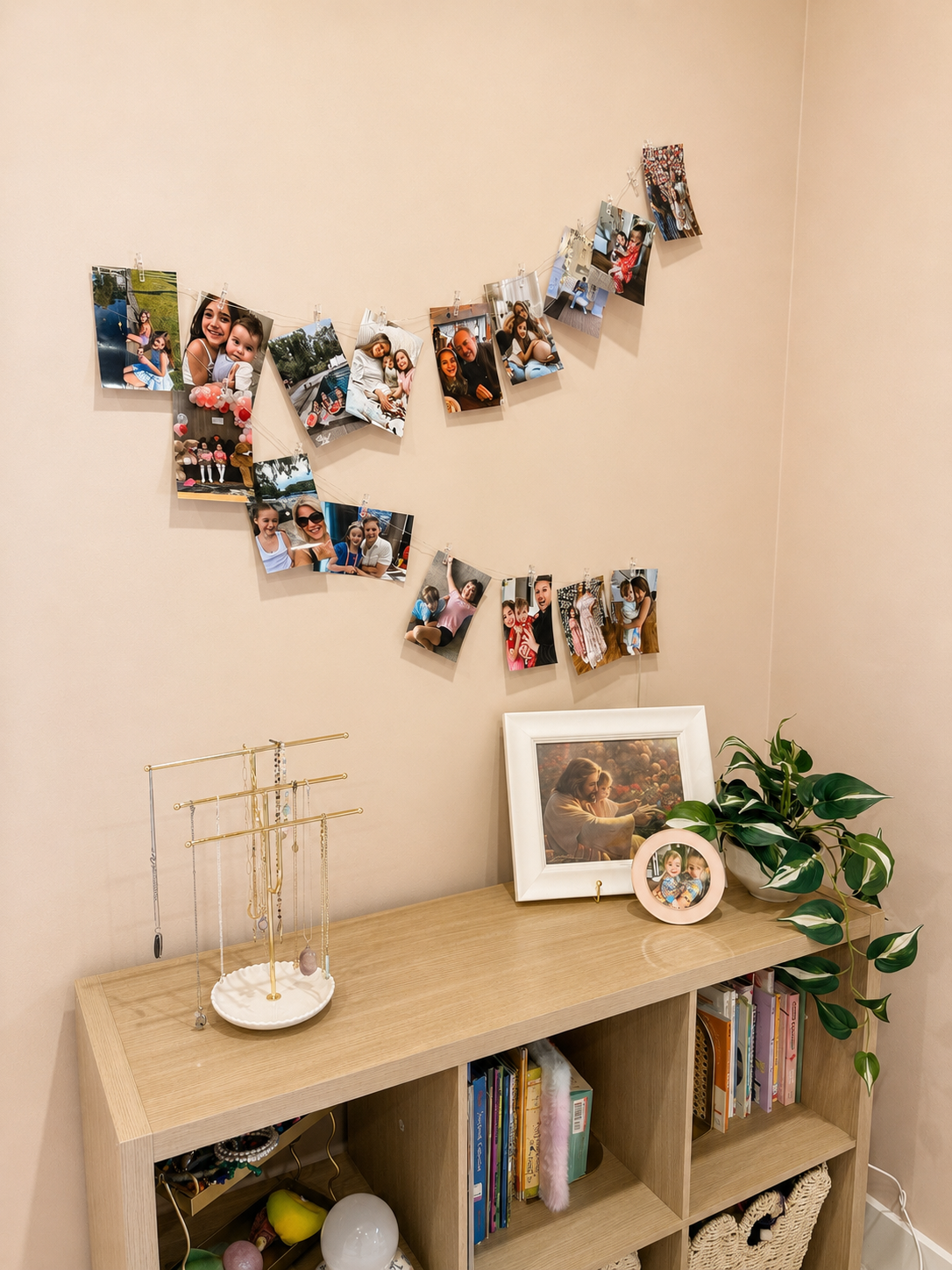 girl bedroom furniture bookshelf styled with hanging photo display and jewelry stand